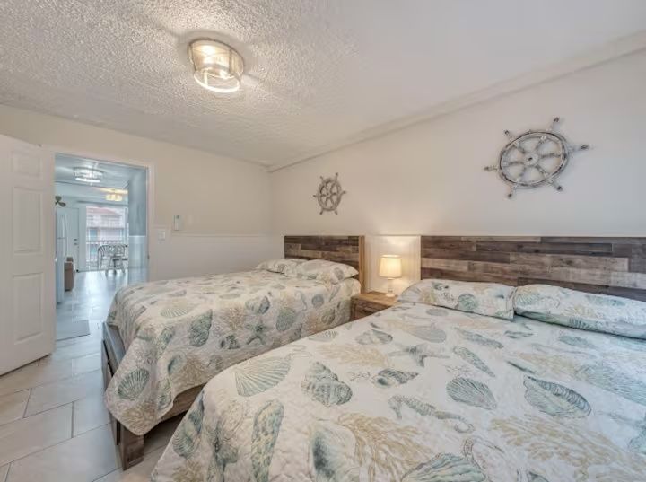 Bedroom with two full beds